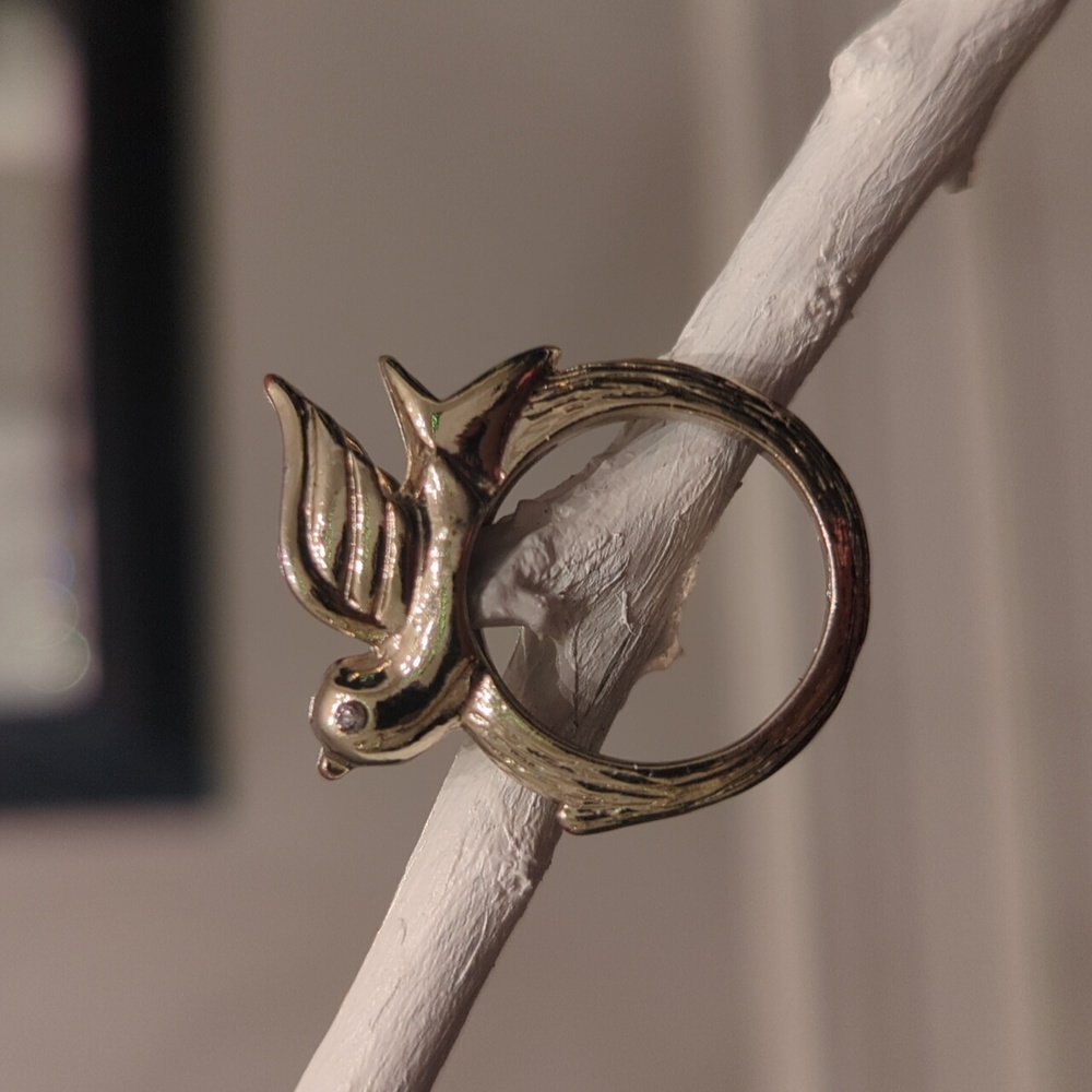 Silver/gold tips Dove on an infinity tree branch